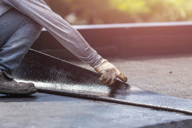Professional Basement Waterproofing technician working in Russiaville, IN